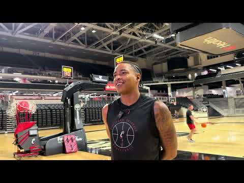 Elijah Perryman talks to the media at summer workouts