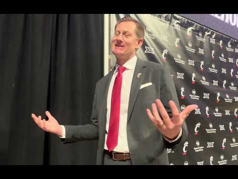 Bearcats AD John Cunningham talks to media after Calhoun's first presser