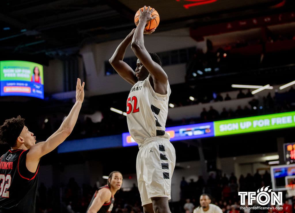 Bearcats upset No. 8 Kansas on the road, 84-68