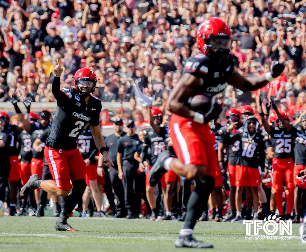 Bowl Eligible, No. 24 Bearcats rough up Cowboys on the road, 49-17